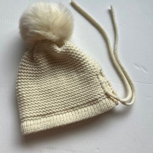 Kyi Kyi Faux Pom Pom tie back in Ivory